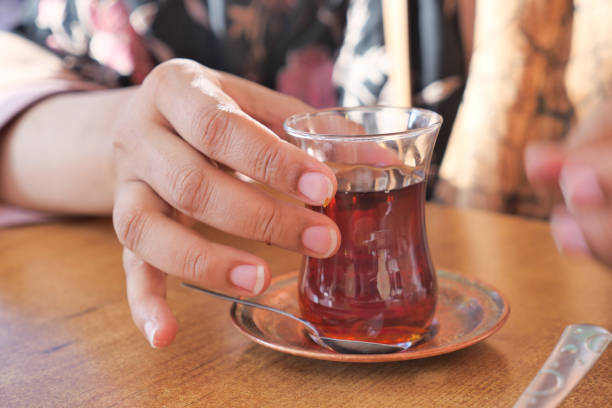 istock drinking Traditional turkish tea on a cafe 1865258112
