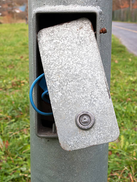 istock cover open due to maintenance on electrical lamp post 186526242