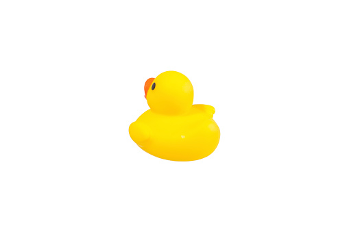 yellow plastic funny duck on white background