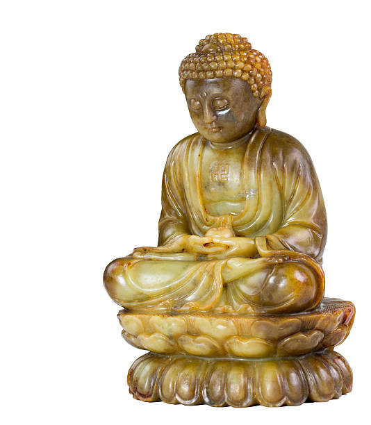 Ancient multi-colored jade Buddha. The symbol of peace and enlightenment.