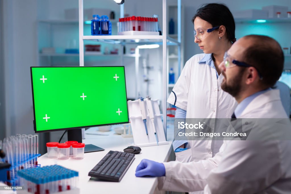Scientists Using Technology Modern Medical Research Laboratory With Two Scientists Using Computer ...