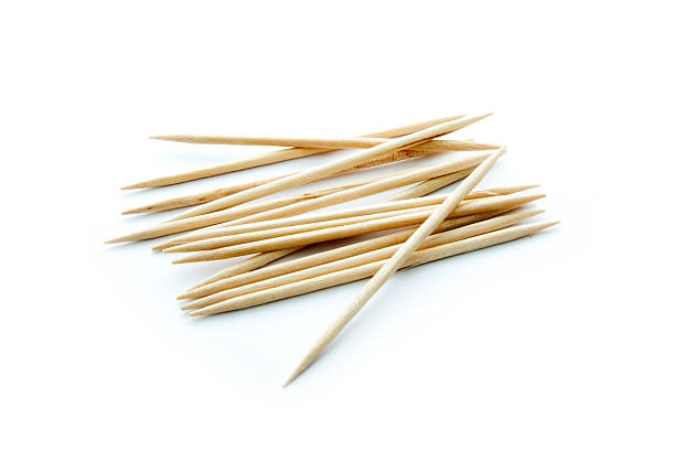 toothpicks group of toothpicks isolated on white background cocktail stick stock pictures, royalty-free photos & images