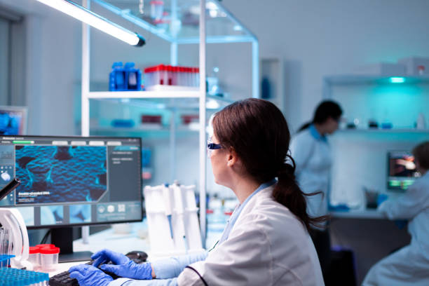 istock Specialist scientist pharmacology working on computer in hospital vaccine engineering 1865333127