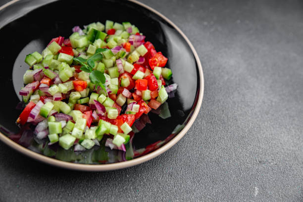 istock salad vegetable cucumber, tomato onion fresh vegetables appetizer ready to eat healthy eating cooking appetizer meal 1865334165