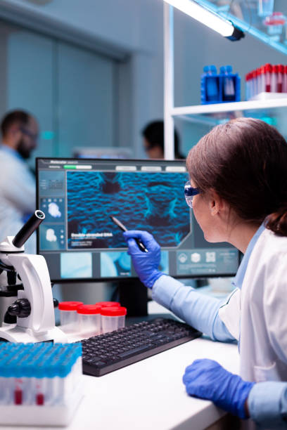 istock Biochemist scientist working on the laboratory to discovery a technology 1865354383