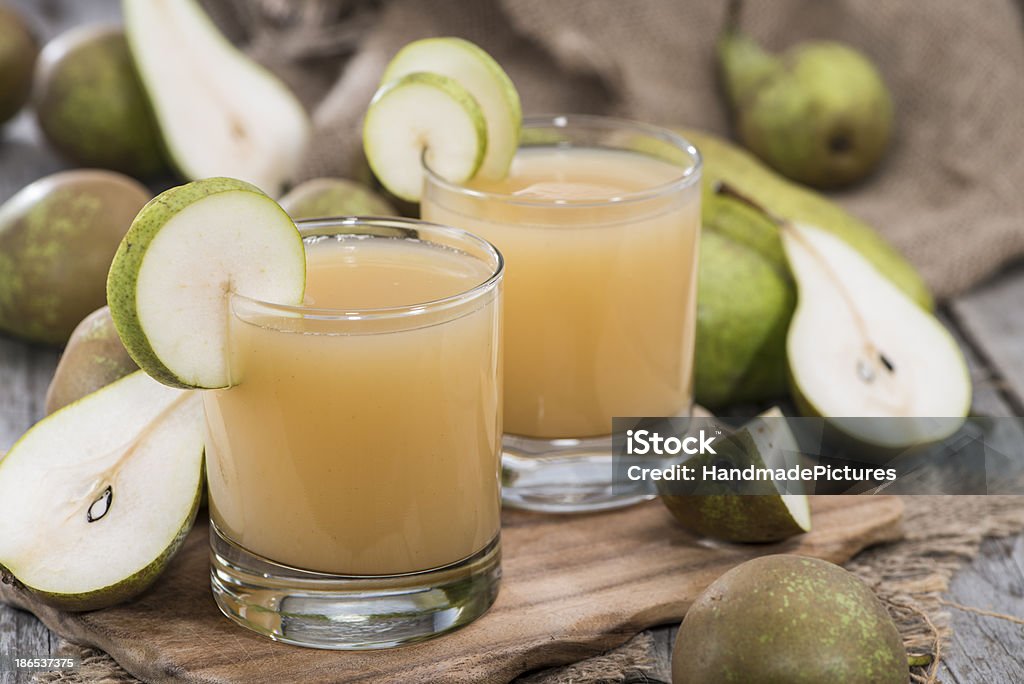 Homemade Pear Juice Fresh homemade Pear Juice with some fresh fruits Pear Stock Photo