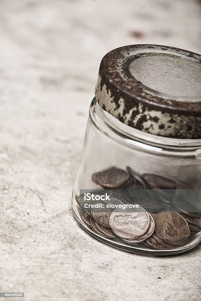 Pennies in a Jar Young childs collection of Pennies in a Jar Abraham Lincoln Stock Photo