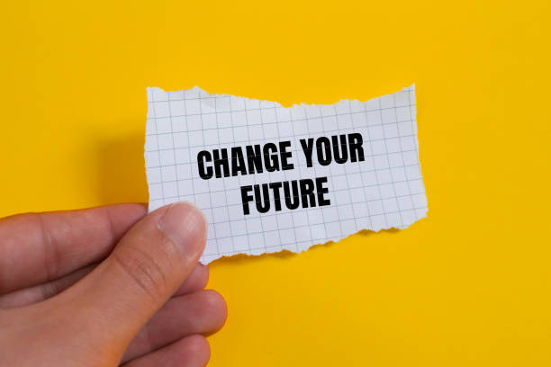 istock Change your future lettering on ripped paper piece 1865402644