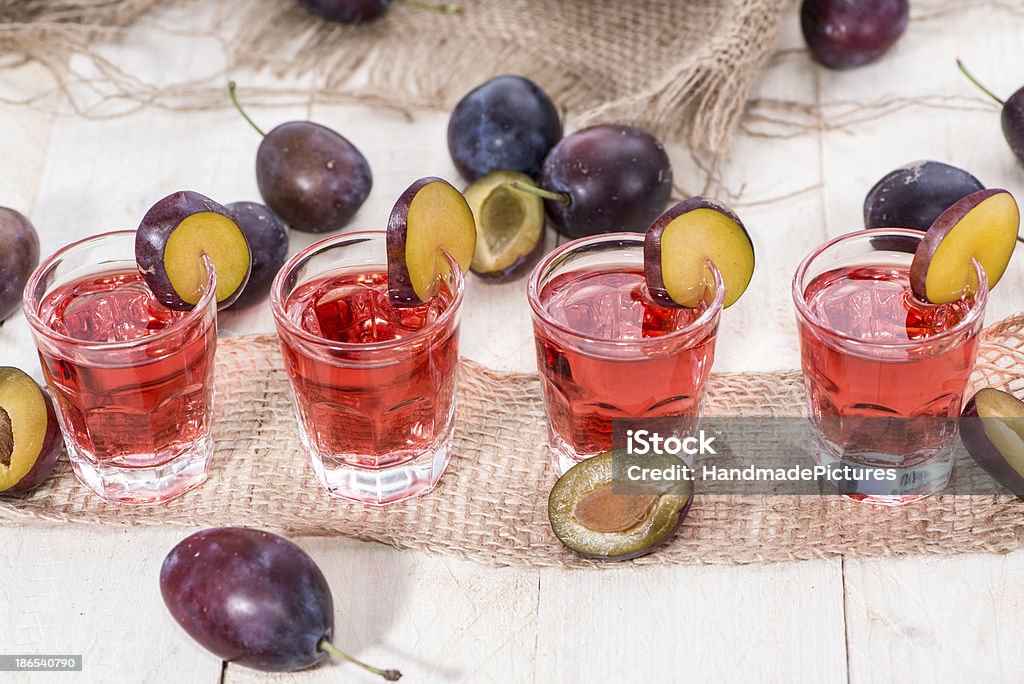 Licor de cereja fotos - Foto de stock de Ameixa - Fruta royalty-free