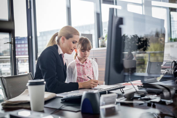 Modern working woman with child stock photo