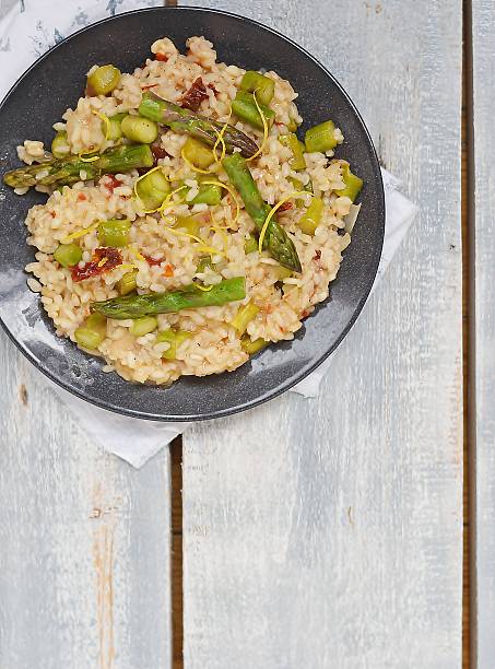 istock asparagus and sun dried tomato risotto 186543738