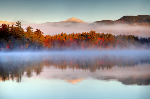 Autumn snow-capped mountains in the White Mountains National Forest in New Hampshire