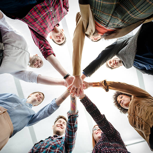 istock Young Business People Showing Team Spirit 186544021