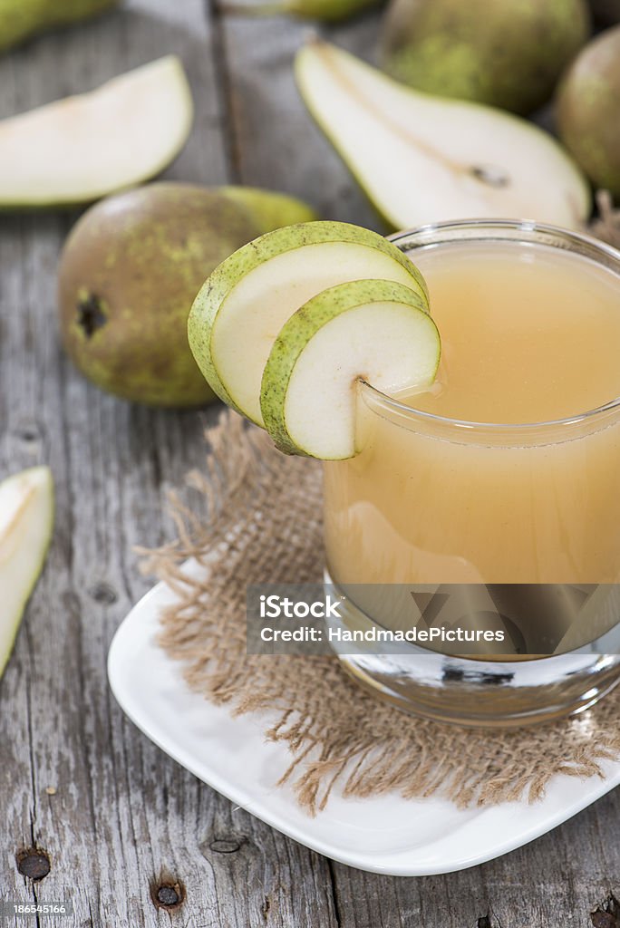 Portion of Pear juice Portion of fresh made Pear juice Autumn Stock Photo