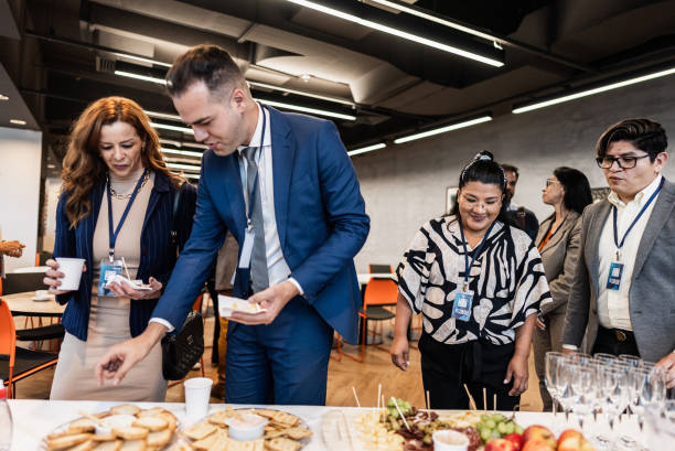istock Business people getting food during conference coffee break 1865466132
