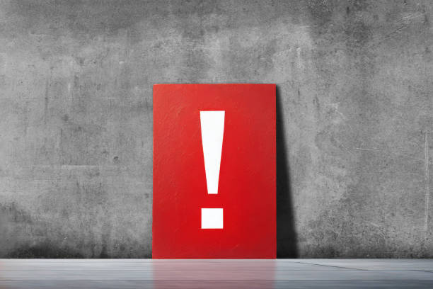istock Exclamation mark signboard on textured concrete wall background 1865476694