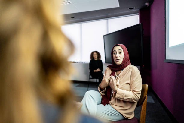 istock Muslim woman talking during conference 1865477772