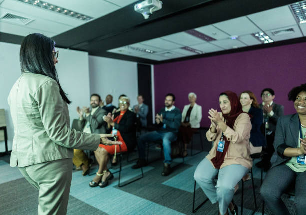 istock Business woman doing presentation during conference 1865479393