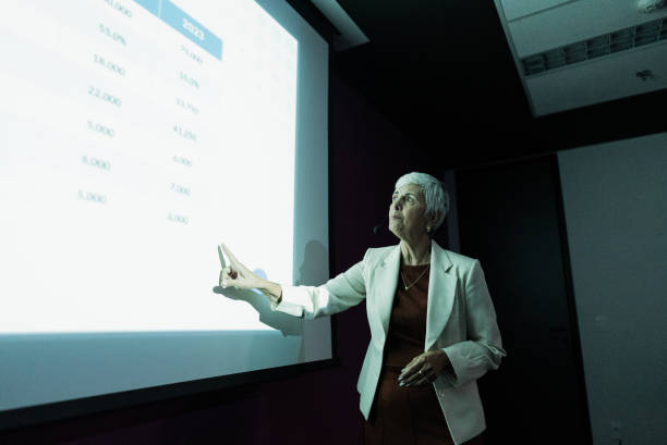 istock Business woman doing presentation during conference 1865481552
