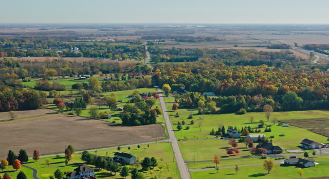 Leftward Flying Drone Shot of Farmland near South Vienna, Clark County, Ohio on Sunny Day in Fall