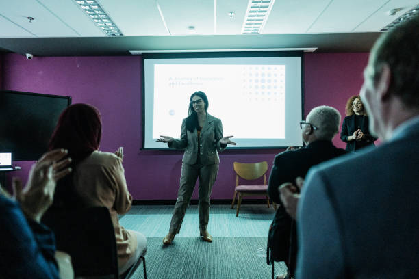 istock Business woman doing presentation during conference 1865486887