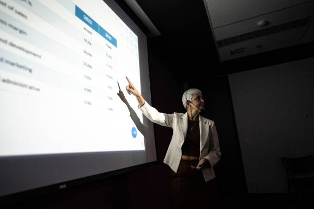 istock Business woman doing presentation during conference 1865493333