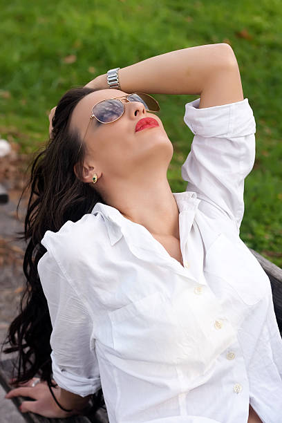 istock Attractive woman on a bench 186549618