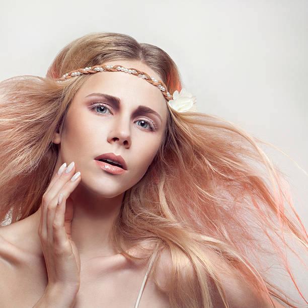 istock Beautiful lady with a white flower 186549779