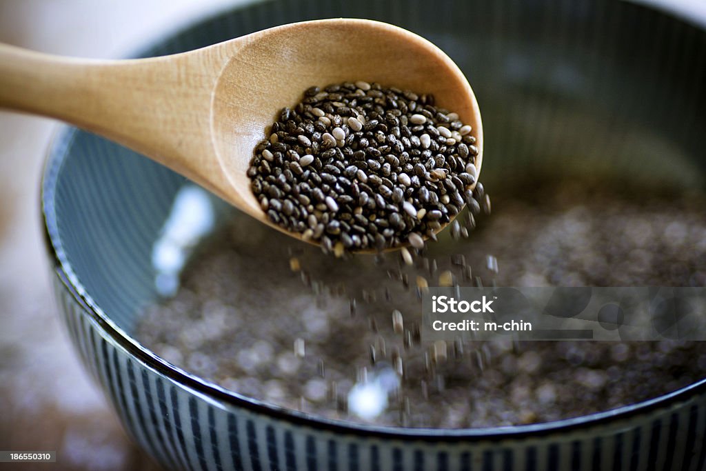 Chia seeds Nutritious chia seeds on a wooden spoon, superfood Antioxidant Stock Photo