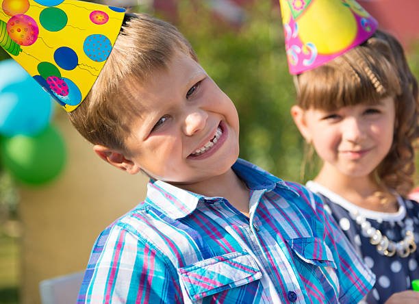 istock Happy children having fun at birthday party 186550594