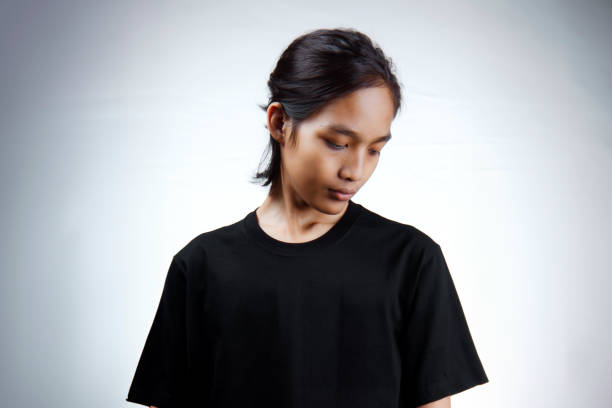 istock Asian men. Young Asian man close up shot 1865506037