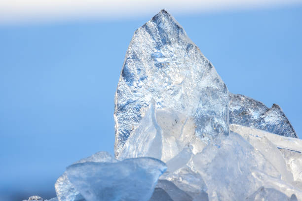 istock Transparent ice shards on a sunny winter day, close up photo 1865510844