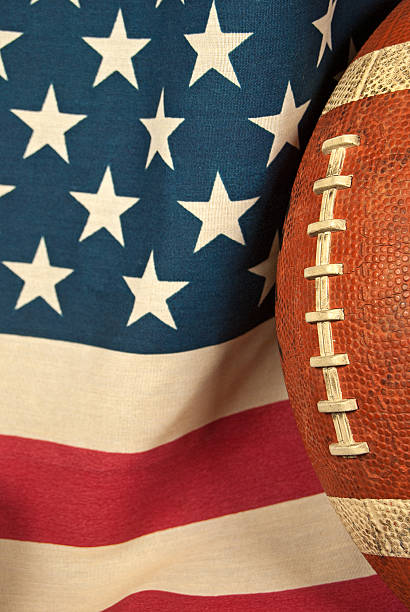istock football with American flag 186551545