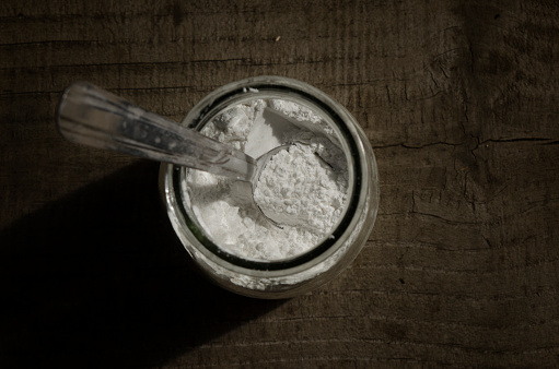 tablespoon baking powder or baking soda or any fine white powder such as self-rising flour, viewed from above.
ingredients generally used in cooking