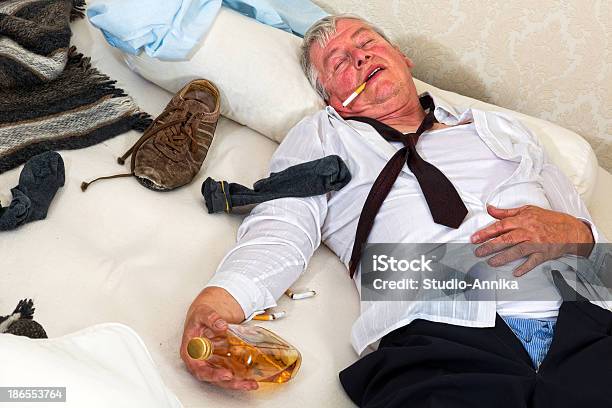 Drinking In Bed Stock Photo - Download Image Now - Drunk, Senior Men, Cigarette