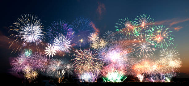 istock Colorful fireworks of various colors over evening sky 186554850