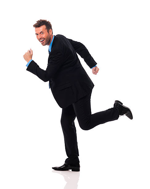 istock Handsome and smiling businessman hurry up 186555580