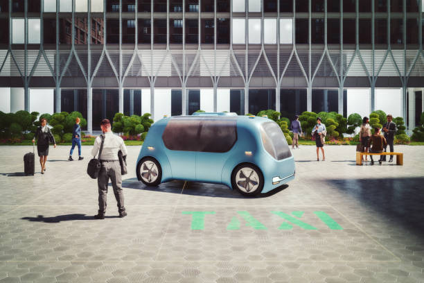 istock Businessman using smart phone app to call driverless autonomous taxi 1865573579