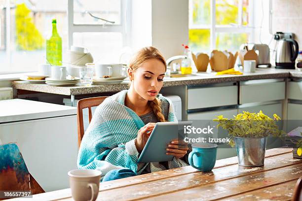 Student With Digital Tablet At Home Stock Photo - Download Image Now - Digital Tablet, Autumn, E-Reader