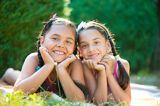 istock Image of two happy sisters having fun 186558235