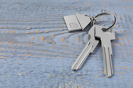 Keys on key ring creative layout isolated on white background. Design element, top view, flat lay. Security concept