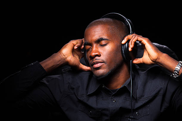istock Man Rocking Out to Tunes 186559619