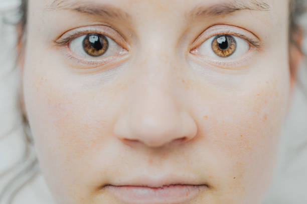 istock Female Brown Colored Eye With Long Lashes Close Up. Structural Anatomy. Human Face and Iris Macro Detail. Soft Skin. 1865603882