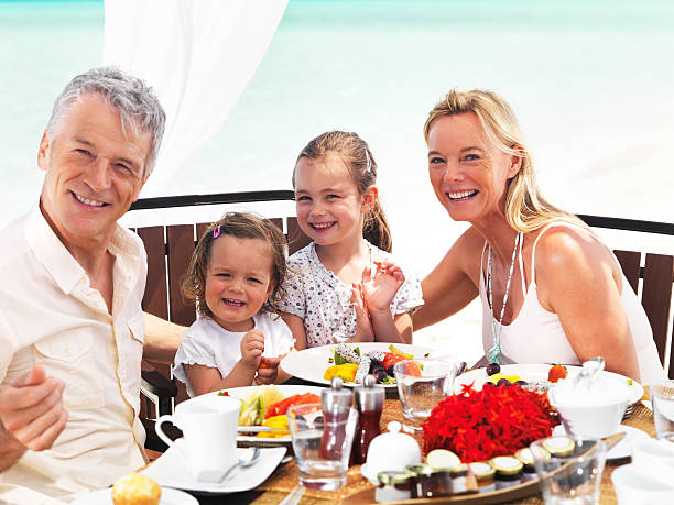 380+ Beach Dinner Family Stock Photos, Pictures & Royalty-Free Images