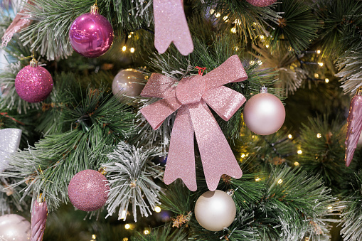 Christmas balls on branches of an evergreen tree