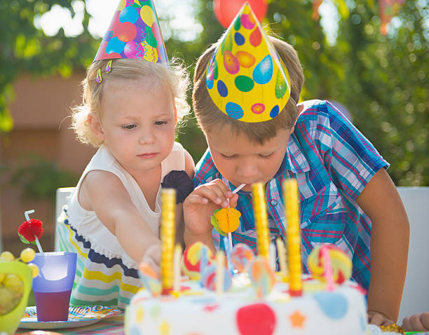 istock Happy children having fun at birthday party 186562403