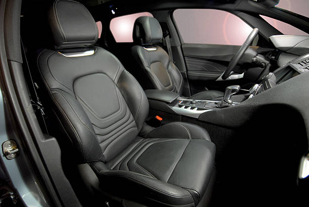 Leather seats for the interior of a black car stock photo
