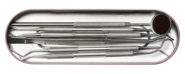 istock Dentist medical instruments set in metal box on isolated background 1865644742