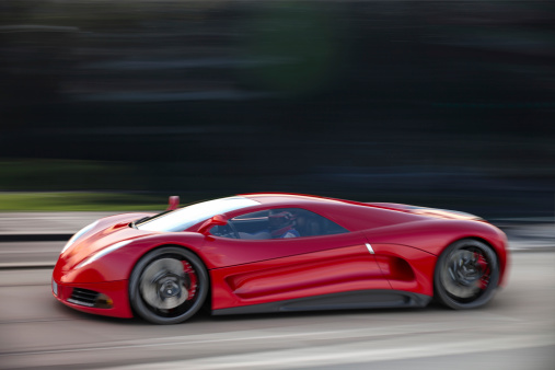 A modern red sports car speeding along a road. Unique and generic sports car design.  Designed and modelled entirely by myself. Very high resolution 3D composite render. All markings are ficticious.