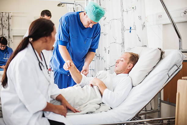istock Doctor taking care of patient 186564925